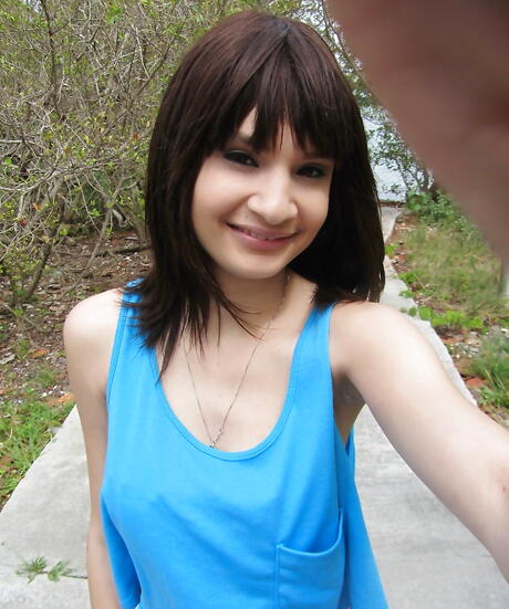 Stunning american teen Jessi Grey in hot bikini exposing small tits and hot ass outdoor