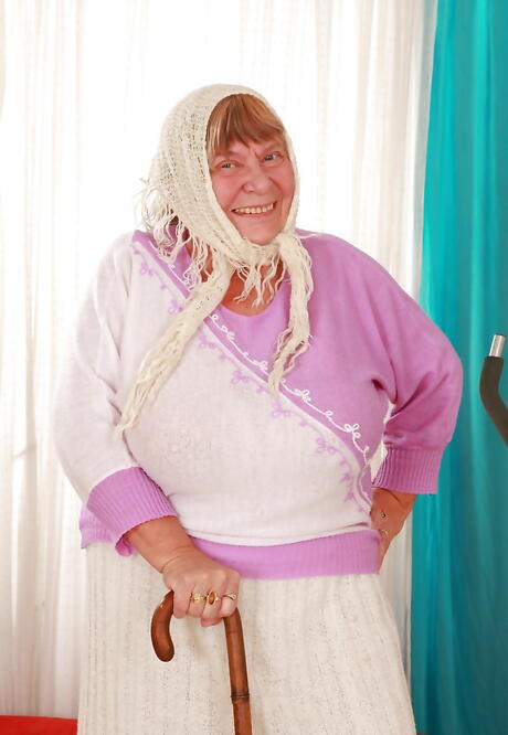 Curious granny Sara G in sexy posing gallery