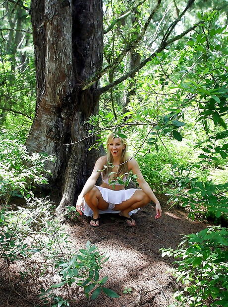 Delightful american blond milf Ashley Fires in hot lingerie reveals big knockers and masturbates outdoor